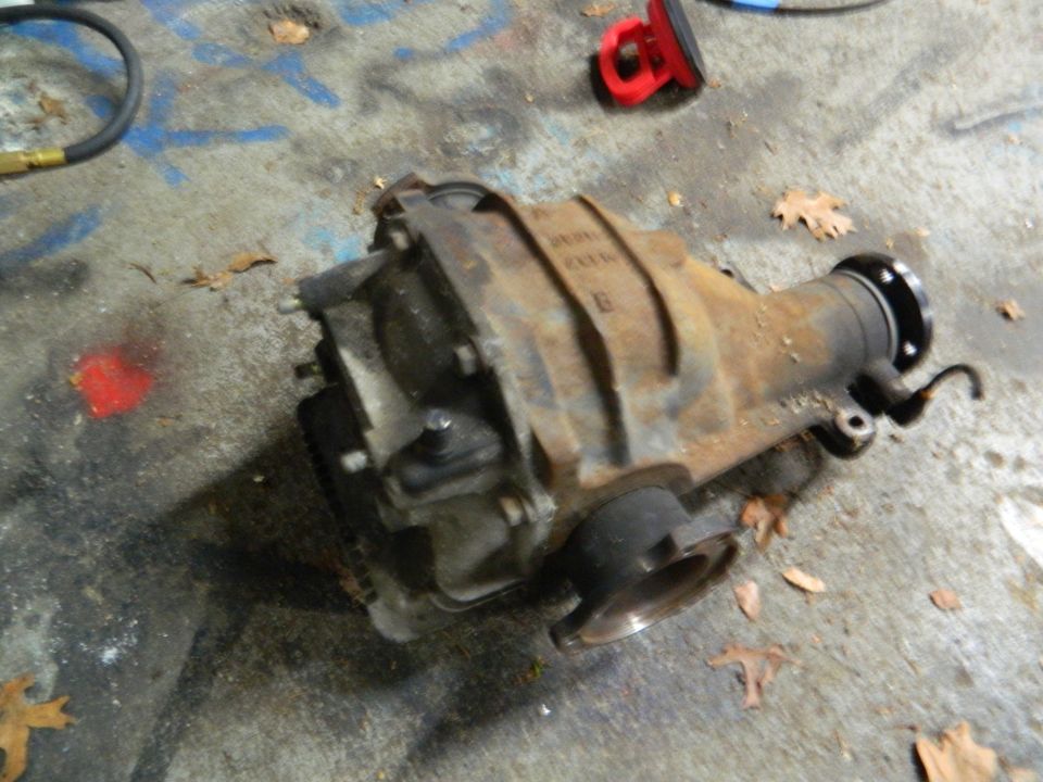 Rusty differential part on concrete floor