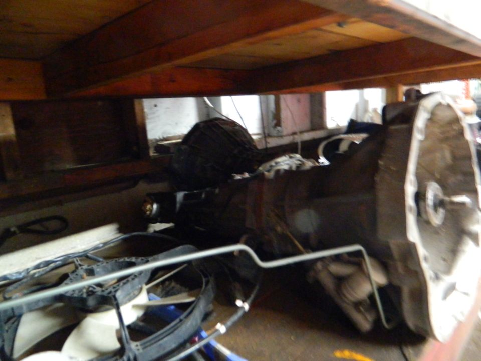 Transmission assembly and a cooling fan with shroud