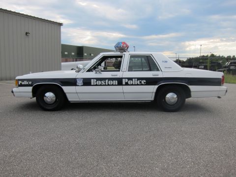 1991 Ford LTD Crown Victoria - This police car has "Boston Police" written on its side, along with a badge and the number 1139.