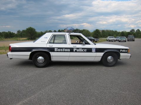 1991 Ford LTD Crown Victoria - This police car has "Boston Police" written on its side, along with a badge and the number 1139.