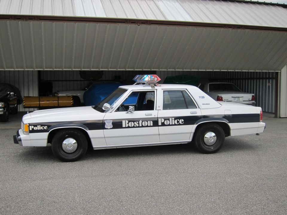 1991 Ford Crown Victoria LTD police car with "Boston Police" text on the side