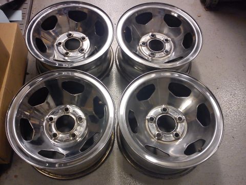 1997 Chevrolet Silverado 1500 - Four chrome wheels are shown, likely for a truck or SUV.