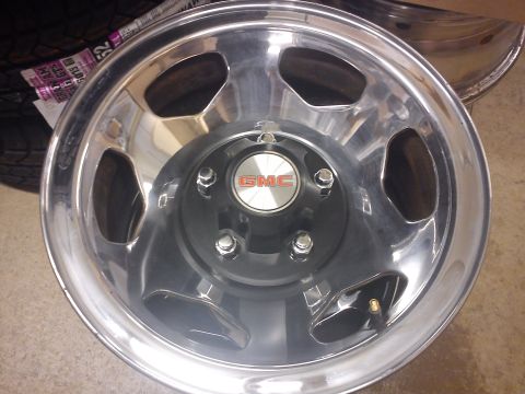 1997 Chevrolet Silverado 1500 - A single chrome GMC wheel is shown, with a tire visible in the background.