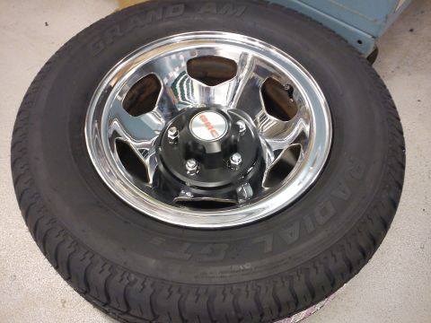 1997 Chevrolet Silverado 1500 - Close-up of a GMC wheel and tire assembly, likely from a truck or SUV.