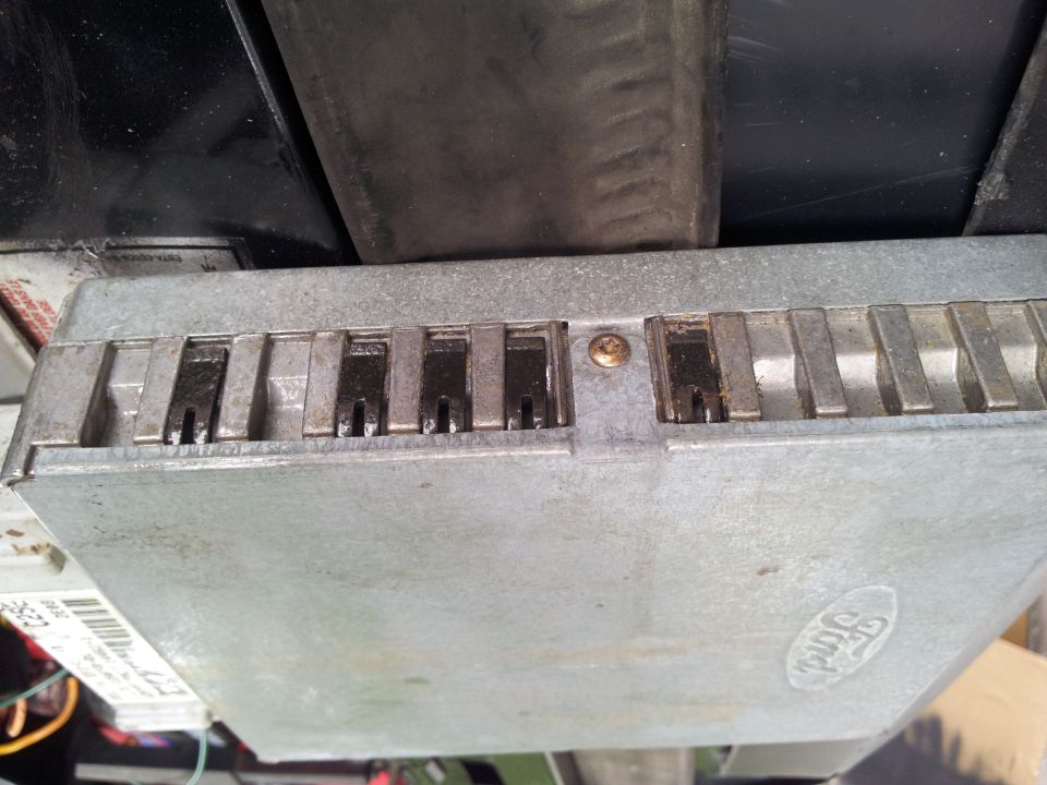 Ford electronic control unit with metal casing and multiple connectors