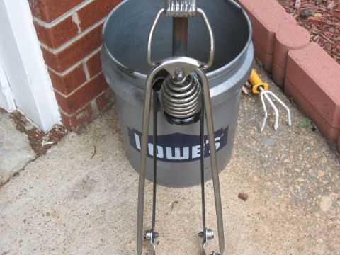 1994 Ford Bronco - A motorcycle front fork assembly is shown in front of a bucket.