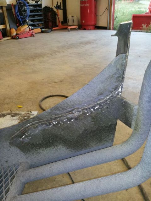 1995 Ford F-150 - Custom metal fabrication work shown in a garage environment.