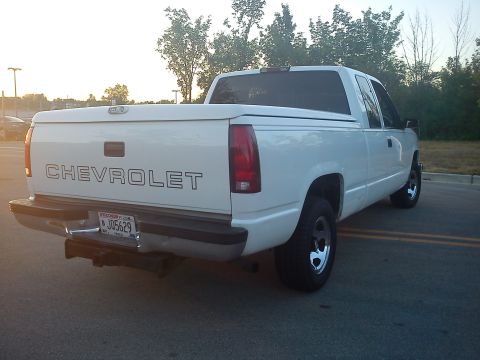 1997 Chevrolet Silverado 1500 - White 1997 Chevrolet Silverado 1500 pickup truck seen from the rear.