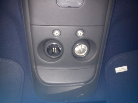 1997 Chevrolet Silverado 1500 - Interior view of a vehicle's overhead console, showing a power outlet and a light.