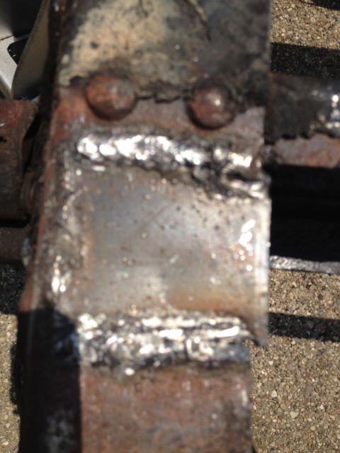 1986 Ford Bronco - Detail of a welded metal frame, possibly from a vehicle undergoing repair or modification.