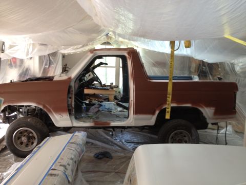 1986 Ford Bronco - A Ford Bronco in the process of being rebuilt, covered in protective plastic and primer.