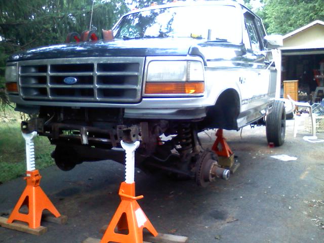 Front end on jacks, allowing the wet noodle suspension to flop all over the place, cant wait to junk this ttb!