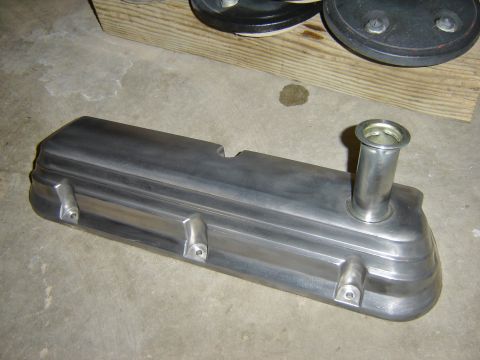 1984 Ford Mustang - An aluminum valve cover with an integrated oil fill tube is shown on a concrete floor.