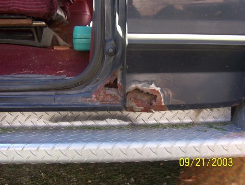 1987 Ford Bronco - rust spot behind driver's side door and door pillar