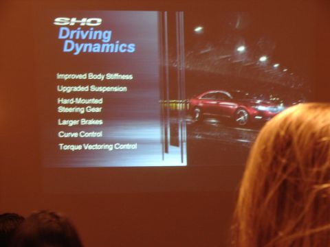1992 Ford Taurus - Presentation slide highlights 'SHO Driving Dynamics' with a red sedan image.