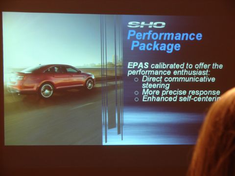1992 Ford Taurus - Presentation slide shows a red sedan with text about the SHO Performance Package.