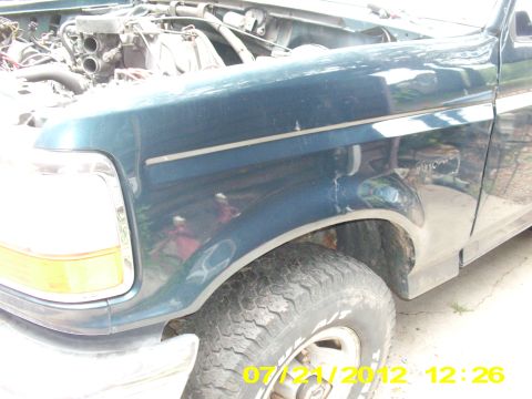 1995 Ford Bronco - This fender is just now starting to bubble below the lower body line, by the bottom edge of the door.