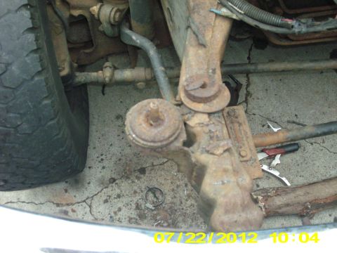 1995 Ford Bronco - As badly as the core support that sit right on this frame mount, the right side bodymount bolt was being stubborn, so i fixed it with a cut…