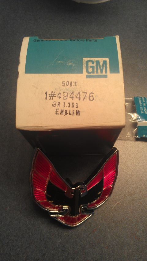 1976 Pontiac Trans Am - This is a GM emblem part, likely for a Pontiac Trans Am, shown with its original packaging.