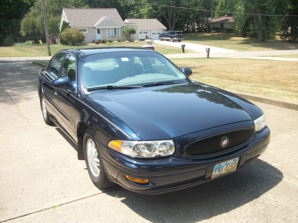 Dark blue 2002 Buick LeSabre parked in driveway