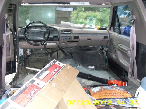 1995 Ford Bronco - not a very good shot but it is the last time that front rubber mat will be in this truck. For the record it's really easy to clean under th…
