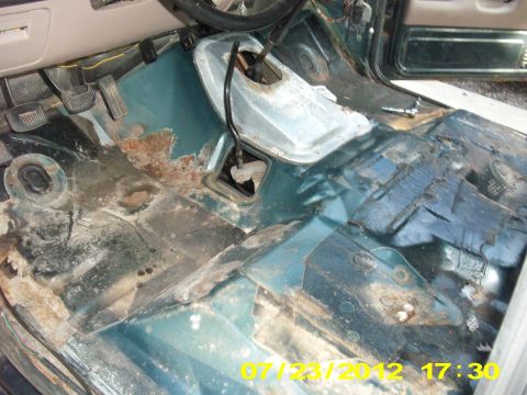 1995 Ford Bronco - removing those old screws with 17 years of gunk in the corners, is no fun. If you want to cheat like i did, a nice sharp hacksaw blade can…