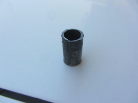 1964 Ford Ranchero - A single metal bushing is shown against a light background. The part appears to be a component for a vehicle's steering system.