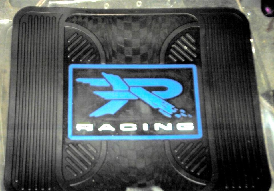 Black car floor mat with blue XR Racing logo and checkered pattern detail