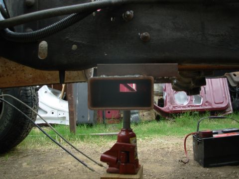 1983 Ford Bronco - I decided to space the new crossmember down one inch to make sure it doesn't contact the cat or d'shaft, and to give a little more room bet…
