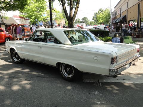 1964 Ford Fairlane - A white coupe with aftermarket wheels is parked on a street, displaying a "For Sale By Owner" sign.
