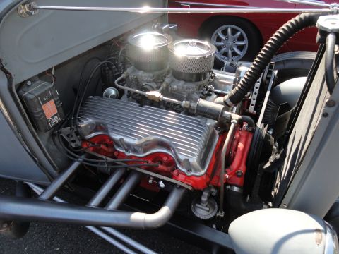 1964 Ford Fairlane - Close-up of a modified V8 engine, dual carburetors and custom exhaust.