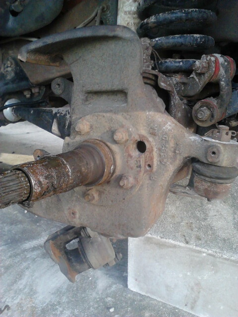 1996 Ford Bronco - Take the caliper off. support it so it doesnt hang by the hose. since the hose is getting replaced i didnt really worry about it too much s…