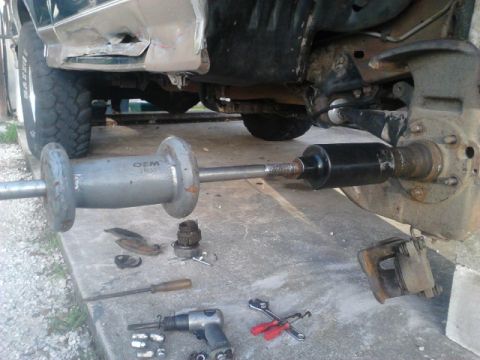 1996 Ford Bronco - Take off the 5 or 6 spindle nuts. to make everything easier i used a slide hammer and spindle puller setup. 3 hits had the spindle off in l…