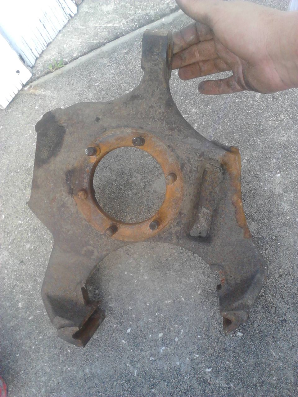 6 stud steering knuckle needed for the swap. Mine was only 5 stud so i had to use these which came from my 88 Bronco after converting from "tophat" lockouts to regualr style

We are going to have to cut off the ears which hold the brake caliper in order to use the Chevy backing plate