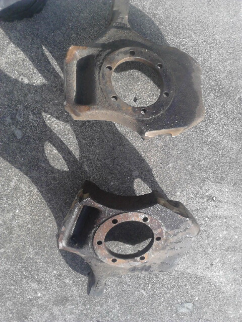 1996 Ford Bronco - the steering knuckles after cutting the caliper ears off. i cut it where i can get the most off without doing too much cutting. Ill grind d…