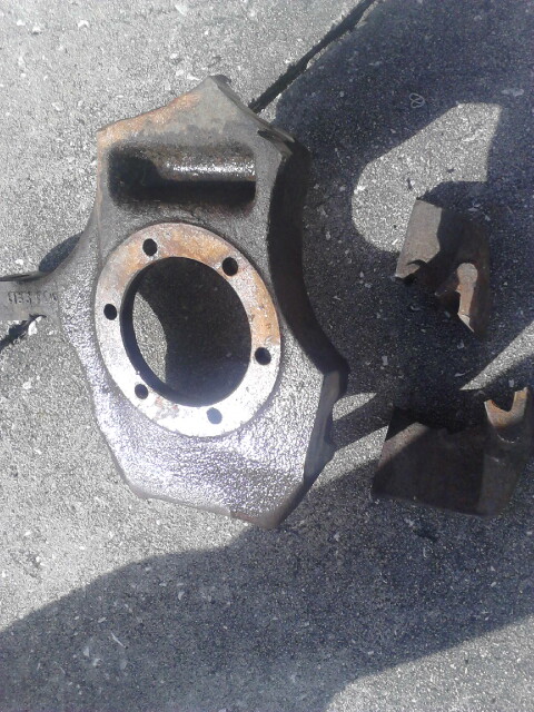 1996 Ford Bronco - The steering knuckle after cutting. I jsut cut where i thought i could get the most off the easiest. ill grind down whatever needs to be on…