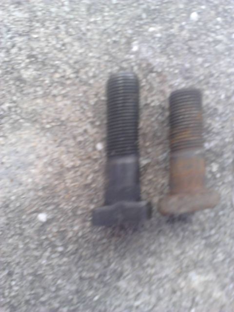 1996 Ford Bronco - The spindle studs. Right is the old Ford studs. Left is the studs i ordered. I didnt have the actuall Chevy studs to use so i ordered these…