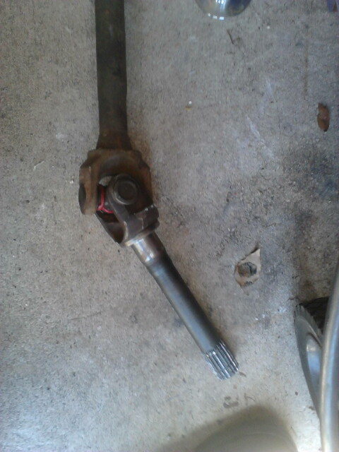 1996 Ford Bronco - The Chevy outter axle shaft on with a new u-joint. To get the shaft back into the axle you MAY need to grind down the edges of the caps. Us…