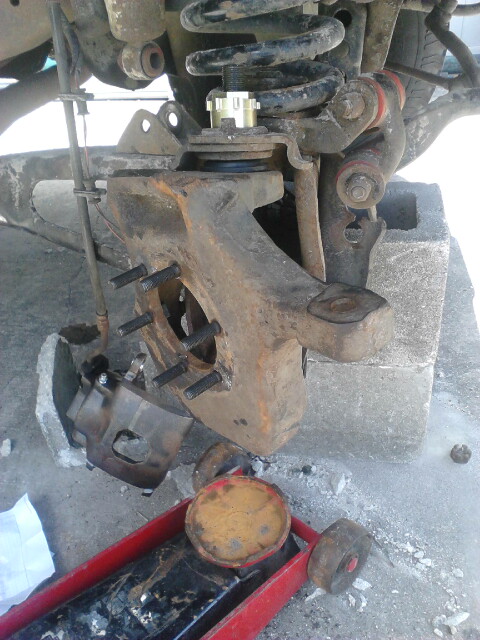 1996 Ford Bronco - Put the knuckle back on. Put the alignment bushing in. According to the Haynes manual. tighten the bottom balljoint to 35-40 lbs. then tigh…