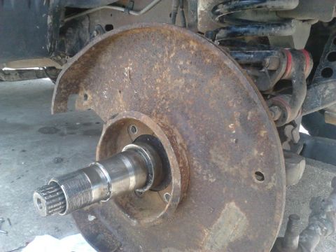 1996 Ford Bronco - Put the backing plate on. Check where it might be hitting the knuckle. Grind where nessesary