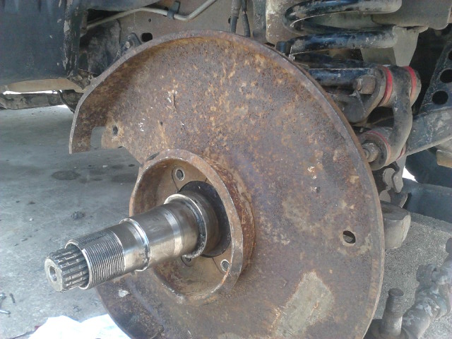 Put the backing plate on. Check where it might be hitting the knuckle. Grind where nessesary