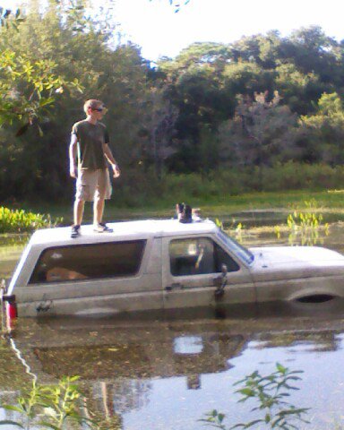 1988 Ford Bronco - first time testing out the snorkel. still working out the kinks. my friend on the roof is NOT happy. not even stuck jsut the starter was be…