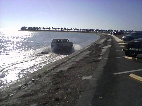 1988 Ford Bronco - taking alittle drive at the causeway. friend told me i wouldnt do it. i showed them. saltwater didnt even hurt a thing