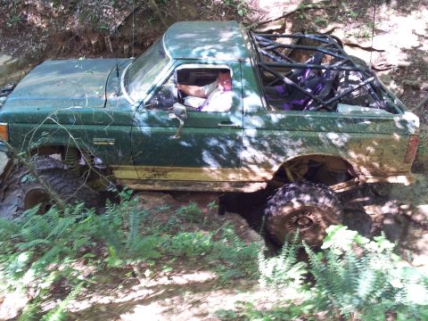 2012 Ford Bronco - This modified SUV navigates a challenging off-road course, its capabilities.