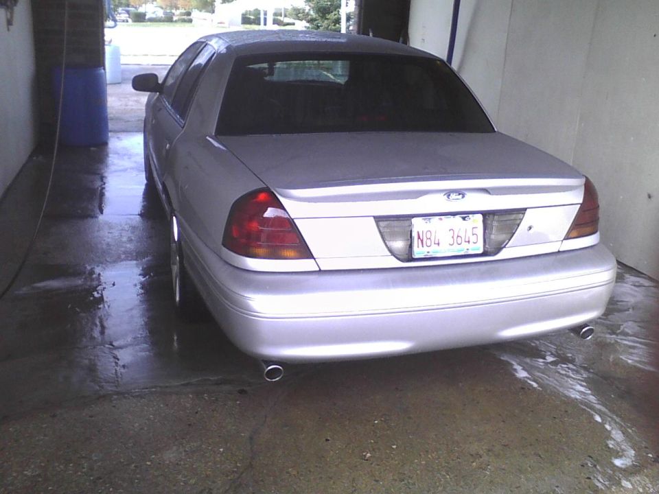 2003 Ford Crown Victoria rear view in a car wash bay. License plate N84 3645