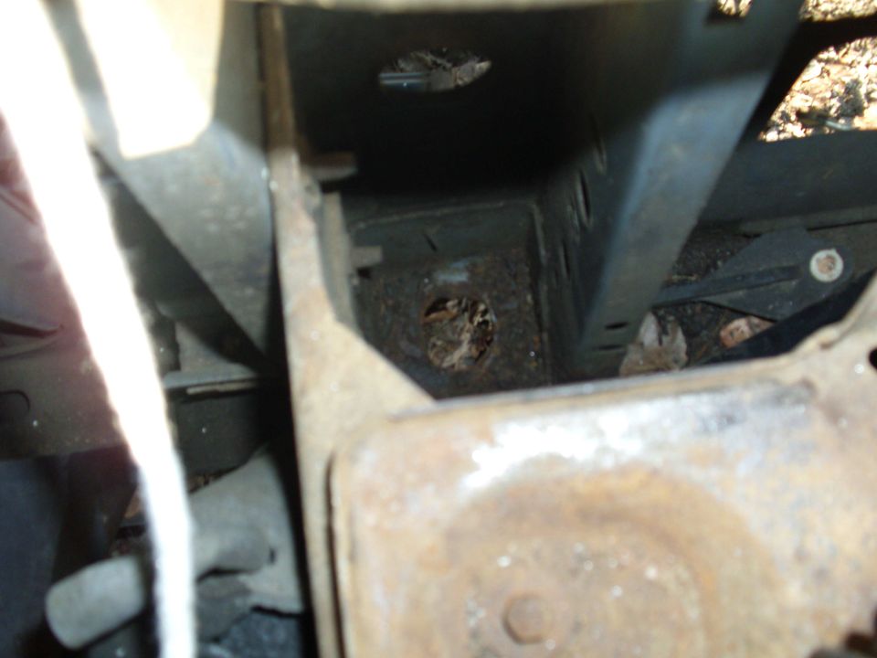 As easy as it was to remove the front body mounts on the 95 (as they where so rusted they just fell out).

 The 88 was pretty much rust free, now it might have took a good breaker bar to get them started, but both sides came out within about 5 mins.  What you see down there is mostly grease.