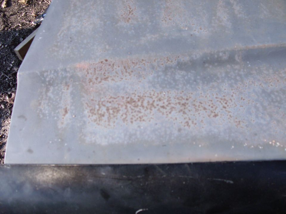 Just some slight surface rust, nothing a good bodyman can't fix but the original enamel paint had seen better days.