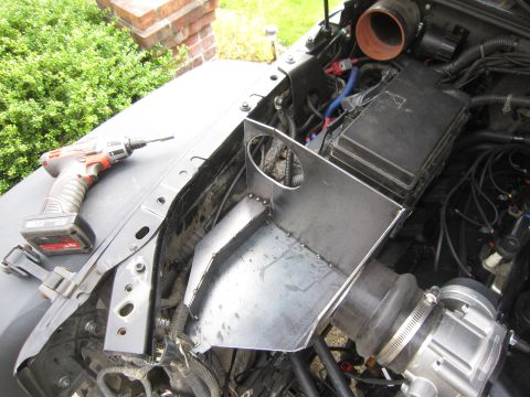 2008 Jeep Wrangler - Custom metal intake box installation in progress, with a drill nearby.