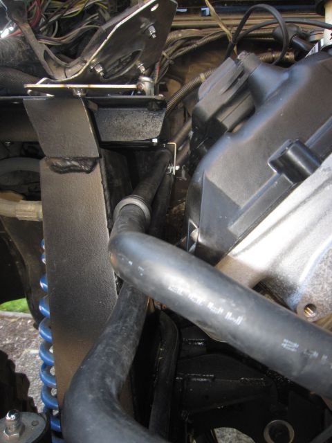 2008 Jeep Wrangler - Custom bracketry and hoses are visible in the engine bay.