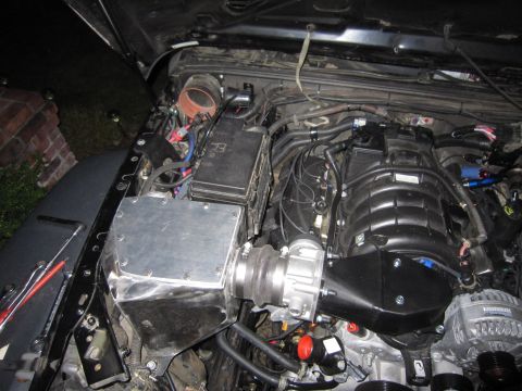 2008 Jeep Wrangler - Engine bay modifications are visible, including a custom intake system and a large black intake manifold.
